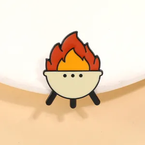 Detailed view of an outdoor camping barbecue grill enamel pin with cartoon flames
