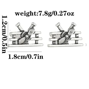 Vintage silver airplane cufflinks for men with detailed propeller plane design