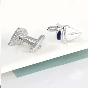 Silver sailing boat enamel cufflinks with dark blue details and bullet back closure