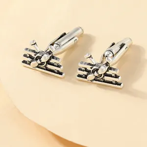 Vintage silver-tone biplane cufflinks for men with detailed wings and propellers