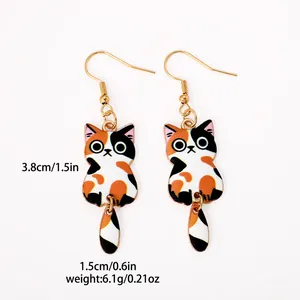 Detailed view of tricolor cat earrings with 3.8cm length and 1.5cm width dimensions