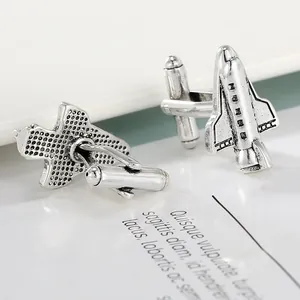 Macro shot of space shuttle cufflinks with vintage silver finish and intricate details