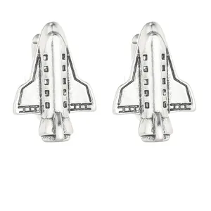 Space Shuttle shaped silver metal cufflinks with detailed vintage finish on white background