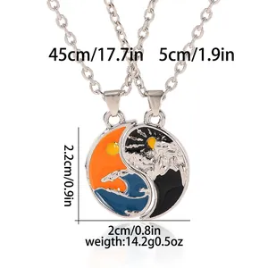 Detailed view of Yin Yang sun and moon split pendant necklaces with dimension labels
