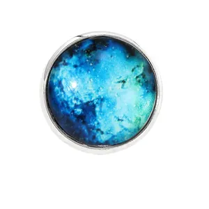 Creative galaxy nebula glass cabochon brooch with a silver metal frame for clothing