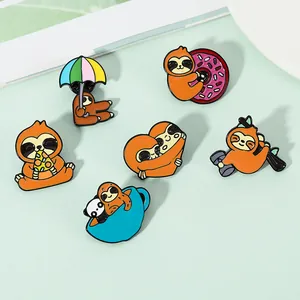 Detailed set of cute brown sloth enamel pins with pizza and rainbow umbrella designs