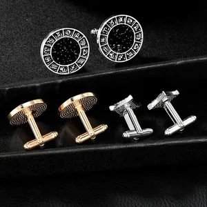 Polished round cufflinks with zodiac symbols and black starry background in a gift box