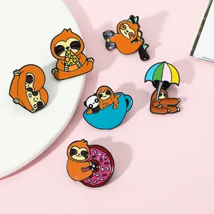 Macro detail of six creative brown sloth enamel pins with vibrant colorful drip oil finish