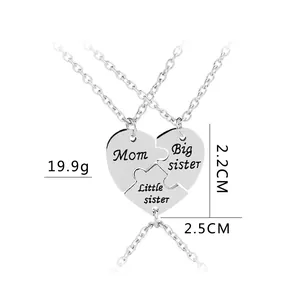 Detailed view of interconnected heart puzzle pendants engraved for Mom and Sisters