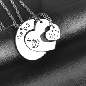 Three-piece interlocking puzzle sister necklaces with Big Sis middle Sis and Little Sis engraving