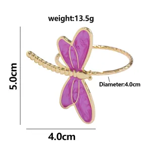 Detail view of dragonfly napkin ring with purple enamel wings and 4cm diameter dimensions