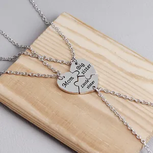 Detailed view of silver heart puzzle necklaces for Mom, Big Sister, and Little Sister