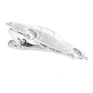 Polished silver tie clip featuring a vintage sports car design on a white background