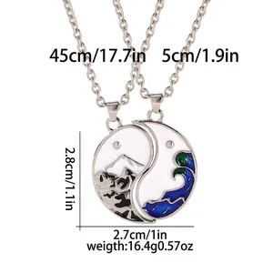 Yin Yang mountain and wave pendant necklaces set with measurements 2.8x2.7cm and 45cm chain