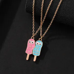 Detailed view of colorful enamel ice cream pendants on gold chains for best friends
