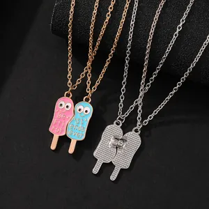 Macro detail of magnetic ice cream pendants showing Best Friends engraving on alloy