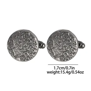 Classic round gunmetal cufflinks with textured moon crater surface for formal business attire