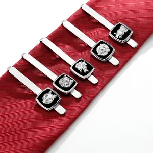 Juego de 5 pasadores de corbata plateados con relieves de animales en corbata roja