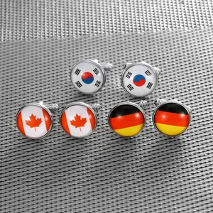 Detailed view of silver cufflinks featuring South Korea, Canada, and Germany flags