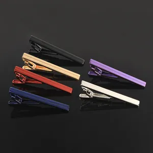 Collection of six colorful metal necktie clips featuring fine grooved texture for men