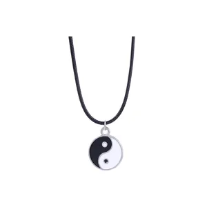 Yin Yang Tai Chi puzzle necklace with black woven cord for best friends and couples