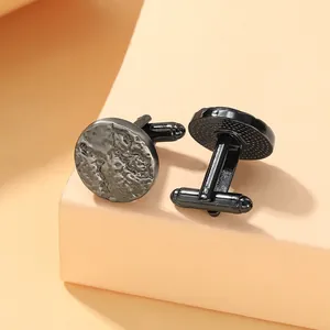 Gunmetal business cufflinks with irregular lava texture and bullet back closure
