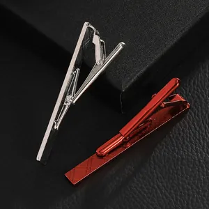 Set of silver and red metallic tie clips with textured grid pattern for men's business suit