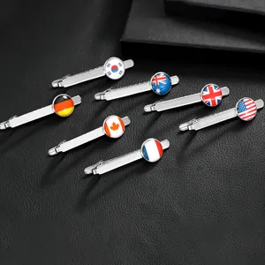 Men's silver necktie clips featuring various national flags on textured leather