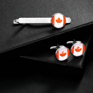 Silver Canadian flag cufflinks and tie clip set with red maple leaf enamel design