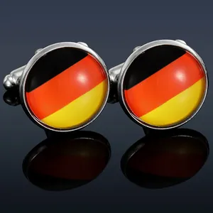 Macro view of German flag cufflinks with silver metal base and glass dome finish