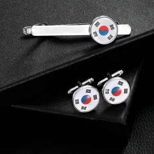 Polished silver tie clip and cufflinks set featuring South Korea flag on black background