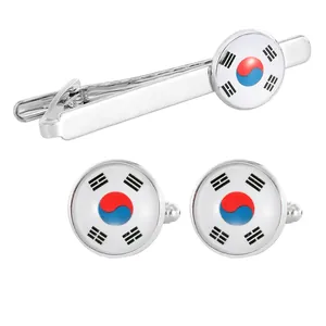 Silver cufflinks and tie clip set featuring the South Korean flag on a white background