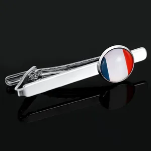 Detailed close-up of a silver French flag tie clip with a reflective mirror finish