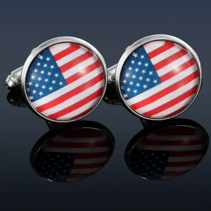 Macro shot of American flag cufflinks with polished silver base and glossy glass finish