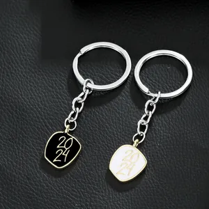 Punk style 2024 graduation shield keychains in black and white enamel with gold trim