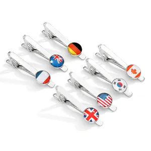 Set of 7 silver metal tie clips featuring various national flags on white background