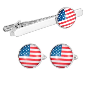 Men's silver cufflinks and tie clip set with American flag design on white background