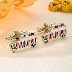 Close-up of vintage car cufflinks with colorful rainbow stripes and enamel finish