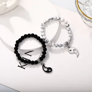 Yin Yang Tai Chi beaded couple bracelets with black and white marble charms for pairs