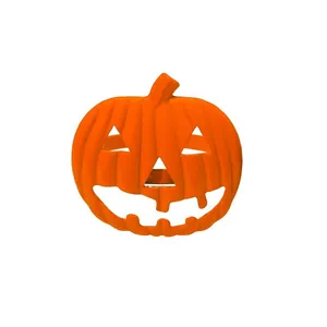 Detalle de servilletero con diseño de calabaza naranja para decoración de mesa Halloween