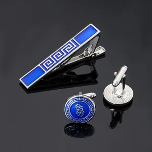 Business men's set featuring silver tie clip and round cufflinks with blue enamel meander