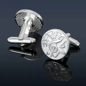 Elegant silver music note cufflinks with embossed treble clef and stave for business shirts