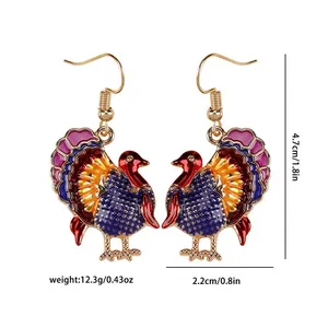 Detail view showing dimensions of colorful turkey drop earrings for Thanksgiving party