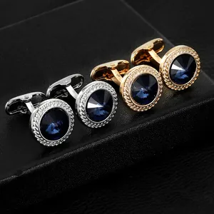 Elegante runde Manschettenknöpfe in Gold und Silber mit blauem Zirkon in Geschenkbox