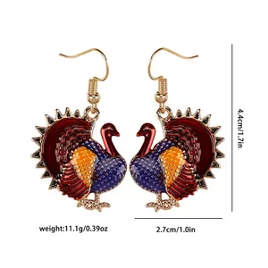 Detail view of colorful turkey earrings showing size measurements and 11.1g weight