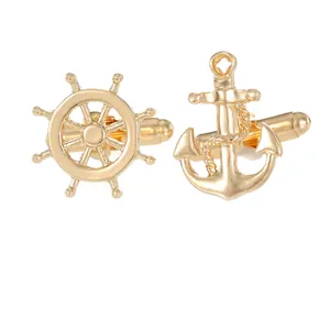 Golden nautical cufflinks set featuring highly polished ship helm and anchor designs