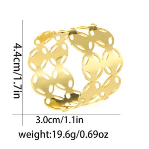 Detailed view of hollow gold napkin ring with precise dimensions 4.4cm by 3.0cm