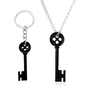 Gotisches Schlüssel-Anhänger-Set mit Knopfaugen-Design in Schwarz und Silber