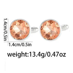 Detail view of round champagne crystal cufflinks with silver metal base and size markings
