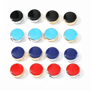 Polished round cufflinks and buttons in multiple colors with gold and silver metal frames